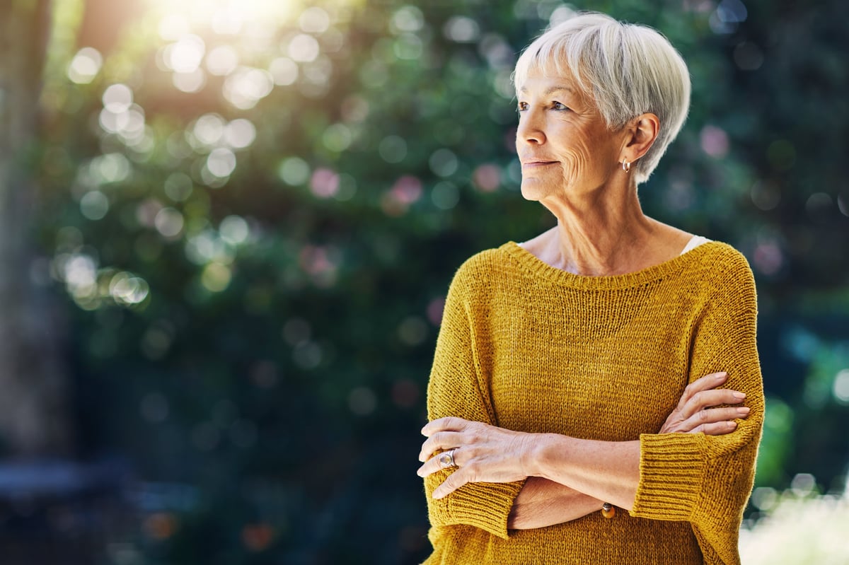 Confident senior woman smiling outdoors